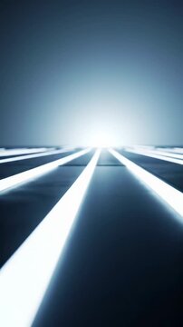 Smooth, low-angle tracking video over a luminous, precision-engineered pathway with crisp glowing white lines towards a bright, ethereal horizon in a futuristic, minimalist environment. Concept of