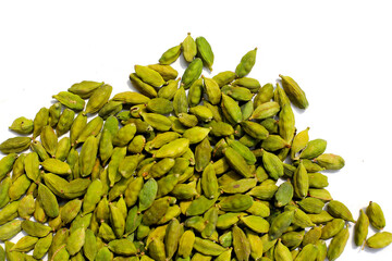 Green cardamom pods with aromatic and medicinal benefits.