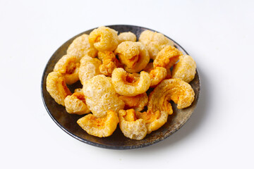 Crispy pork cracklings, a crunchy savory snack.