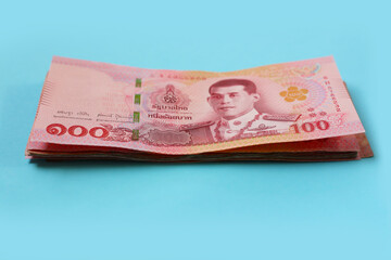 Banknotes with coins of the Thai baht money