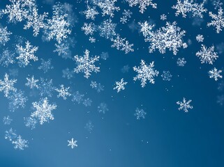Snowflakes falling on a blue background