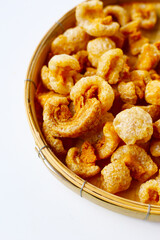 Crispy pork cracklings, a crunchy savory snack.