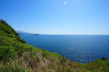 seaside cliff and far island