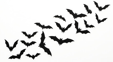 Scattered flock of black bat silhouettes flying in a chaotic pattern isolated on white background with a Halloween theme