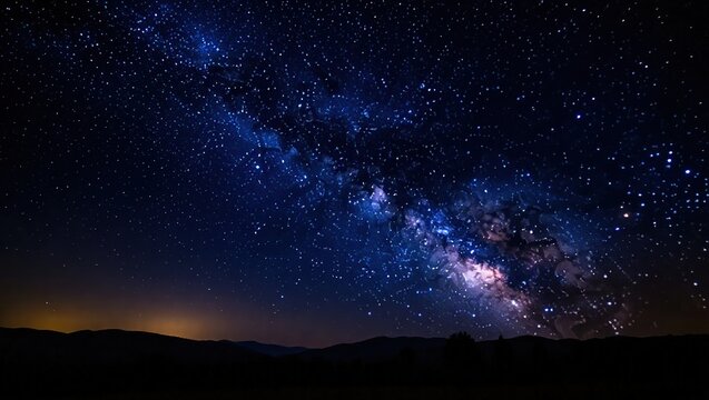 Milky Way's ethereal glow over dark mountain silhouettes, a cele