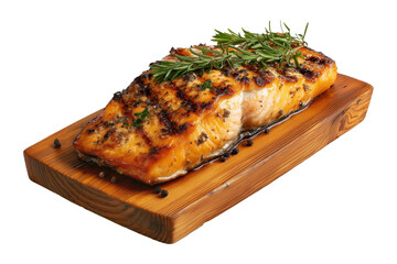 Grilled salmon steak topped with herbs and pepper, served on rustic wood board, isolated on white transparent background, concept of gourmet seafood