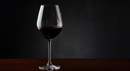 Elegant red wine glass dark product sophisticated atmosphere fine dining concept