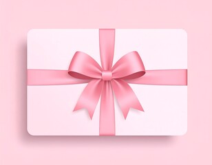 A pale pink gift card adorned with a satin pink ribbon tied in a bow