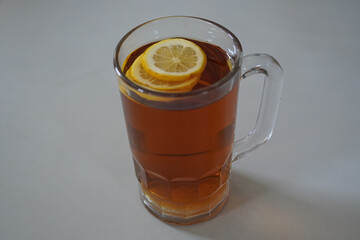 Refreshing Lemon Tea in Glass Mug