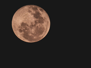 full moon over black sky