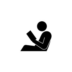 Person Reading a Book Focused on Leisure Activity.