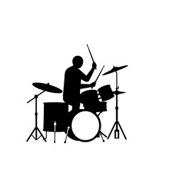 Silhouette of a Drummer Playing Drums.