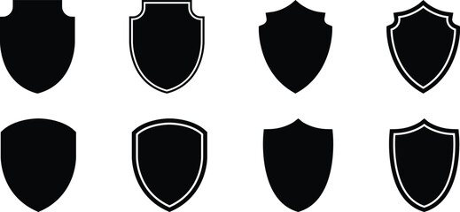 Set of eight black shield icons for security