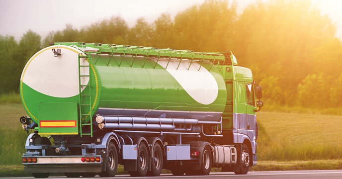 Fototapeta Commercial fuel delivery truck with metal cistern