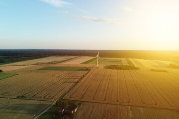 Drone shot of wind turbines in a rural landscape