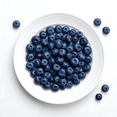 A plate of blueberries on a white background