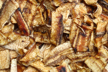close up of dried banana slices, arranged randomly with a distinctive natural texture