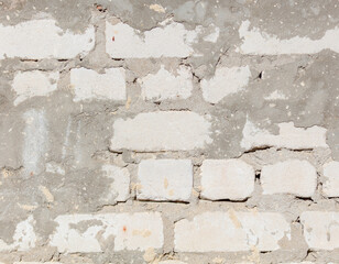 A wall made of bricks with a white background