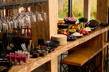 Modern buffet with vibrant dishes and drinks