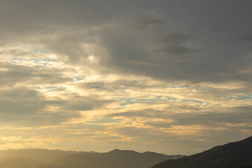 Scenic View of Mountains Under Cloudy Sky