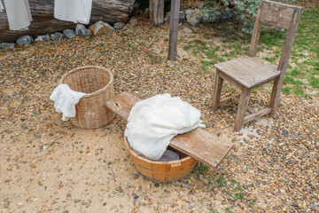 Different clothes drying on laundry line against garden background,clothes hanging laundry on washing line for drying towels drying on the clothesline.