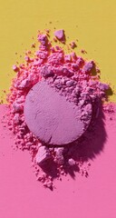 Crushed pink-purple powder cosmetic disc on a yellow and pink background