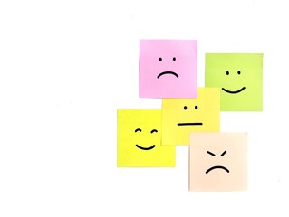 Obraz premium Happy, neutral, and sad emoji on sticky note. mental health concept mood swings, depression, and bipolar disorder. Copy space