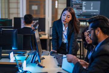 Group of programmers are coding at office.