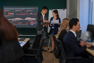 Group of programmers are coding at office.