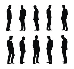 silhouette of a man in a suit working in an office