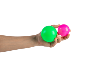 Pink and green plastic ball in hand, transparent background