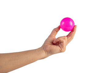 Pink plastic ball in hand, transparent background