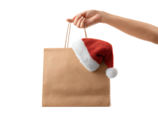 Holiday shopping bag with Santa hat for festive season on a transparent background, cut out