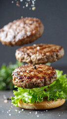 バーガーバンズ上にのっていく焼いたミートパティ