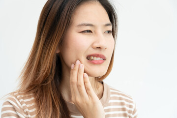 Fototapeta premium Asian woman feel toothache from gingivitis, female suffer tooth, decay problems, dental care. sensitive tooth, decay problem, bad breath, Gingival Recession, Oral Hygiene instruction, tooth extraction