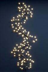 Obraz premium string light garland glowing softly, minimal decoration, copyspace