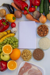 Healthy Meal Planning: Notebook for Recipes Surrounded by Fresh Produce