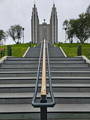 Wonderful view of one of the largest churches in 
Akureyri, Iceland, with a huge staircase in front of the entrance.