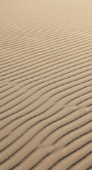 Obraz premium Captivating sand ripples create a mesmerizing abstract pattern conveying vastness and natural beauty