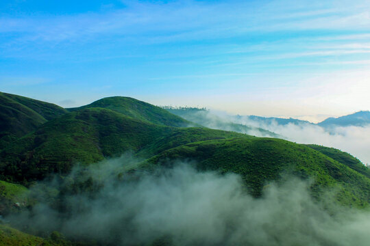 Mountain landscape with clouds Beautiful view of Parunthumpara , Idukki, Kerala, India