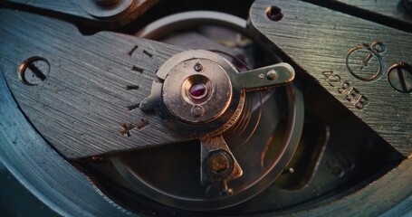 Macro Shot of Mechanical Clock Movement Showing Gears, Wheels and Balance Mechanism. Detailed Close Up, Concept of Time, Craftsmanship, Horology, Precision Engineering and Beauty of Complexity.