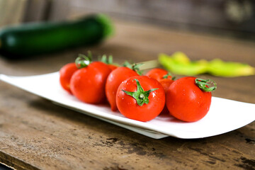 tomatoes on a wooden table