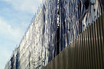 Gray slanding net is used to cover, used for temporary wall around construction site, fence...