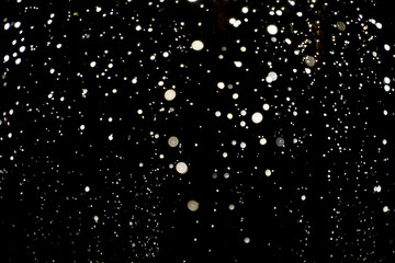 Colorful lights decorated at night during the Christmas and New Year festivals bokeh lights with soft light background Blur wall. White bokeh abstract background wallpaper concept. 