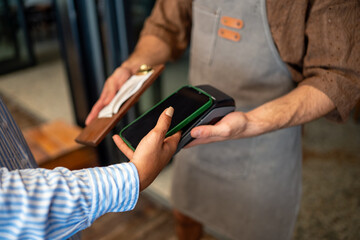 Contactless payment with credit card and mobile wallet offers fast secure transactions