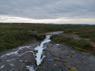 Aerial View of Bruarfoss Waterfall in Iceland with Turquoise Glacial Water

