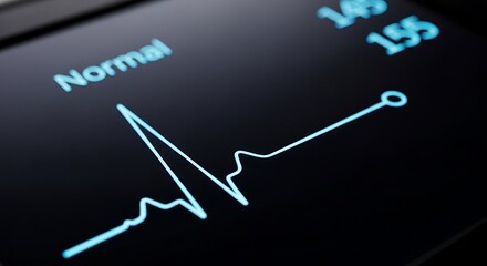Close-up of a medical monitor displaying a normal ECG waveform, heart rate numbers, and health status on a dark screen.