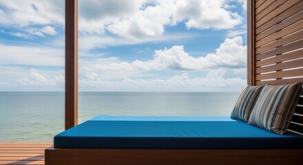 Fototapeta premium Serene Ocean View from a Luxurious Balcony with Daybed and Coastal Scenery Perfect for Relaxing
