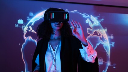 businesswoman wearing virtual reality glasses demonstrates how to use a data management system, business intelligence, data statistics, marketing analysis behind a slide on a screen.,  - Powered by Adobe