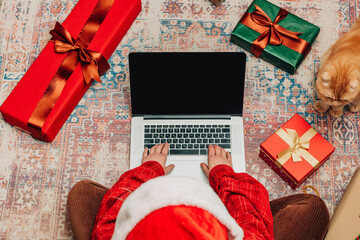 woman searches for Christmas presents online